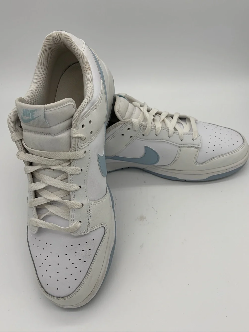 Nike Dunks Men’s Low-Top Sneakers in White with Light Blue Swoosh
